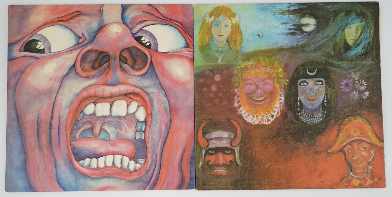 Two King Crimson LP record albums; In The Court of the Crimson King, Island ILPS 9111 palm tree label, and In The Wake of Poseidon, Island ILPS 9127 ‘i’ logo on label and textured sleeve. Condition - good